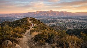 Sunrise over Skyline Trail and the city of Corona, California